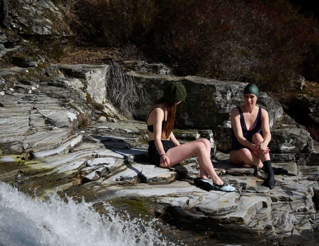 Guest with wild swimming instructor Annie after a wild swim
