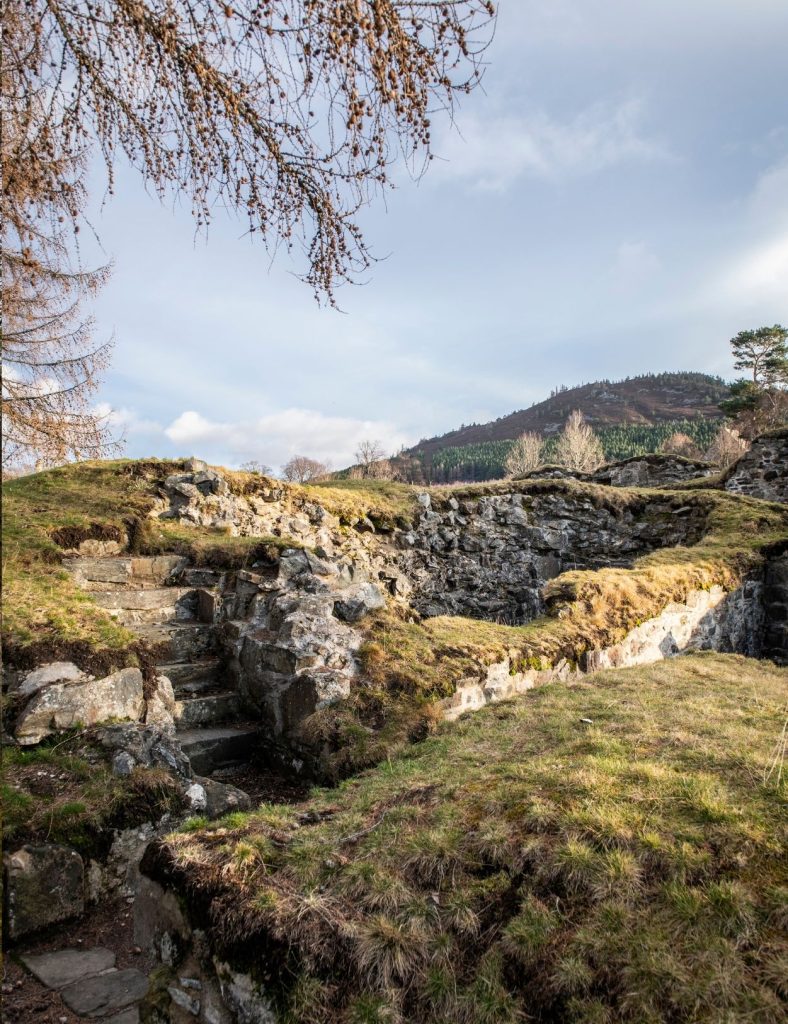 A historic landmark situated in the centre of Braemar village with cloudy sky