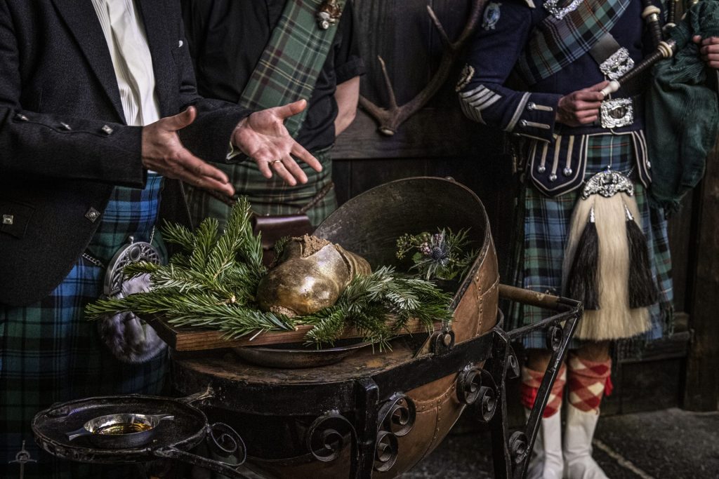 A Burns Night haggis served at the Fife Arms by the side of a piper