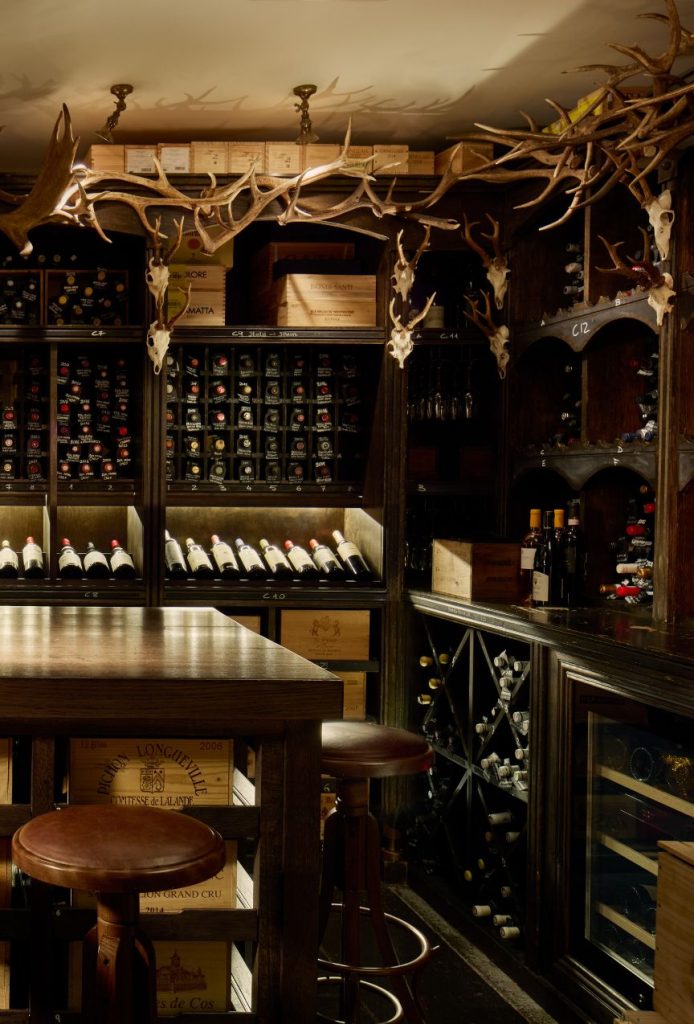 Stag antlers hanging in the wine cellar