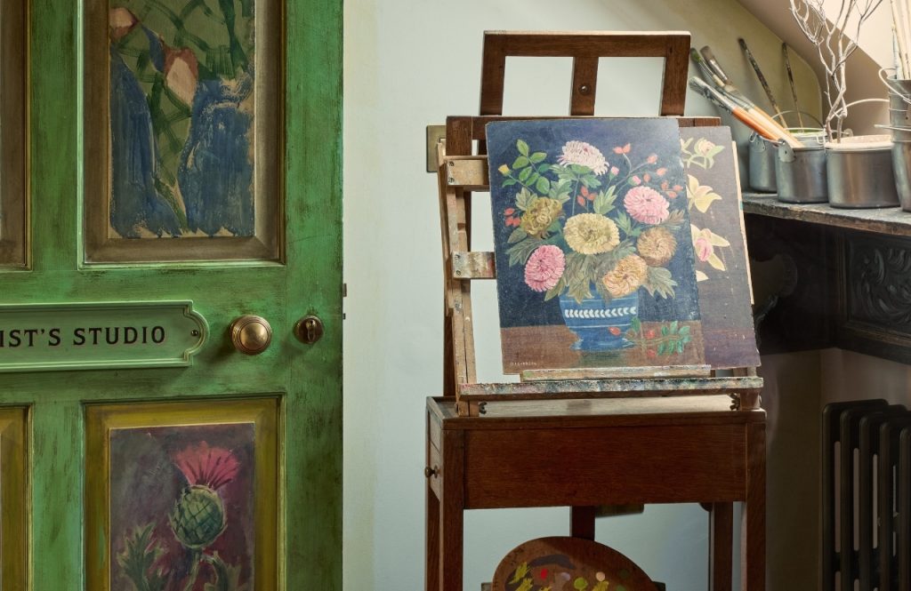 A still life painting on an easel in the Artist's Studio.