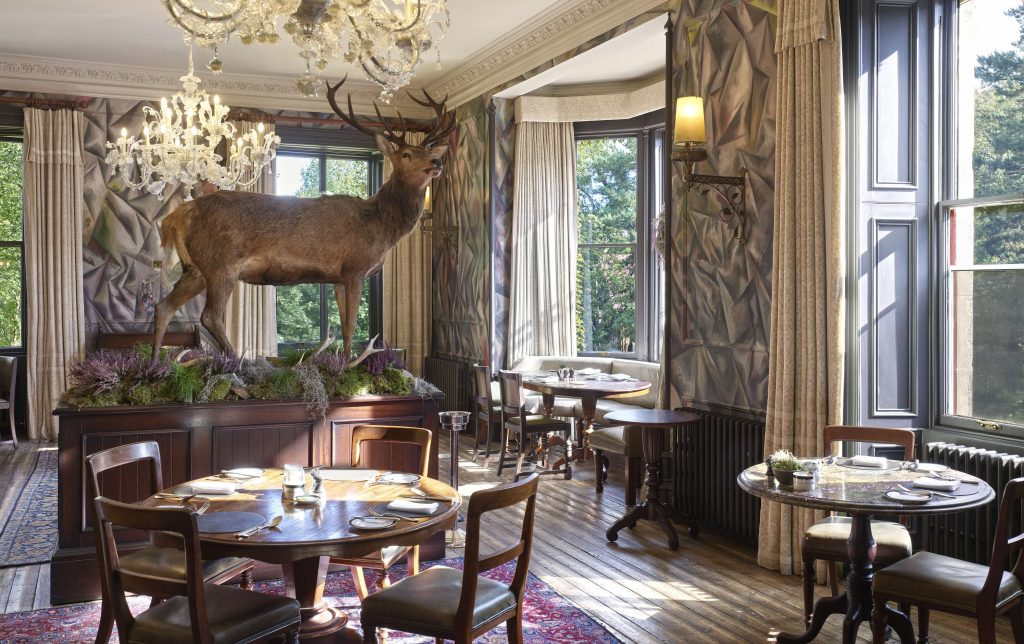 The Clunie Dining Room with sunshine streaming through the windows