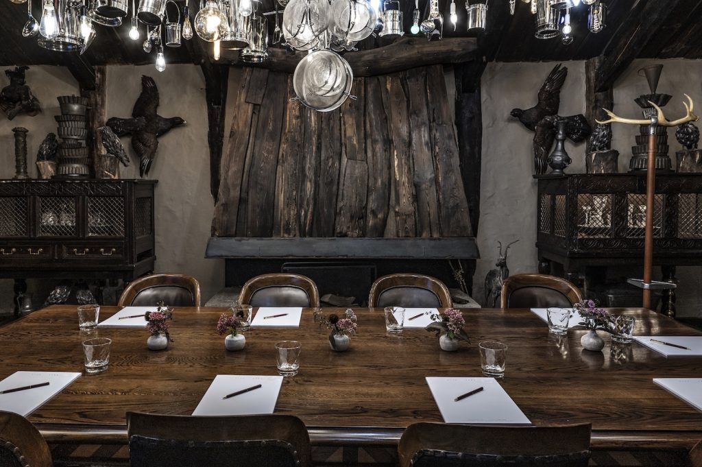 The Fire Room set up with pens and paper for a meeting