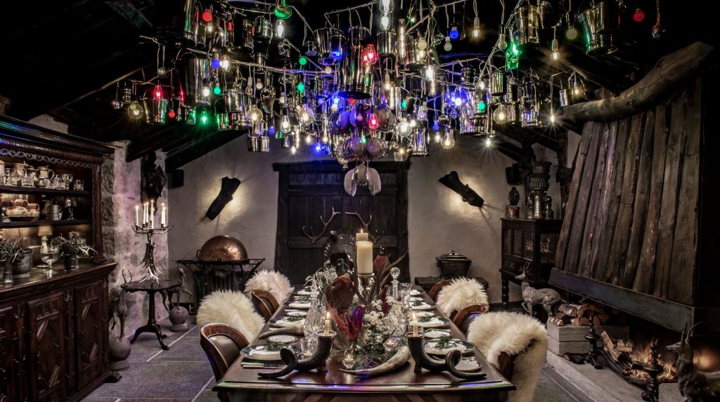 The neon chandelier in the Fire Room