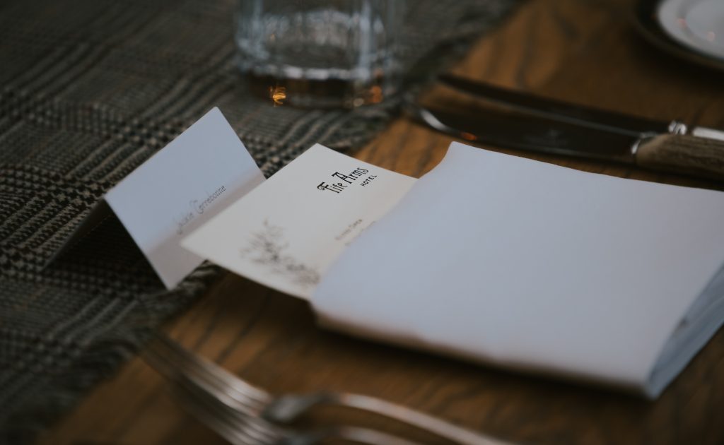 table setting with menu in the fog house