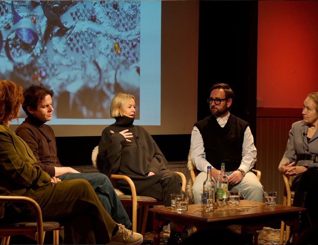Five guests on-stage at Festival of Fashion discussing future textiles