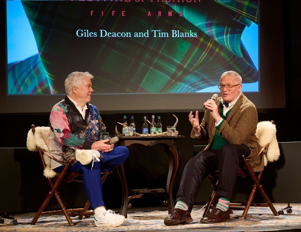 Fashion designer Giles Deacon and journalist Tim Blanks on-stage at Festival of Fashion in 2023