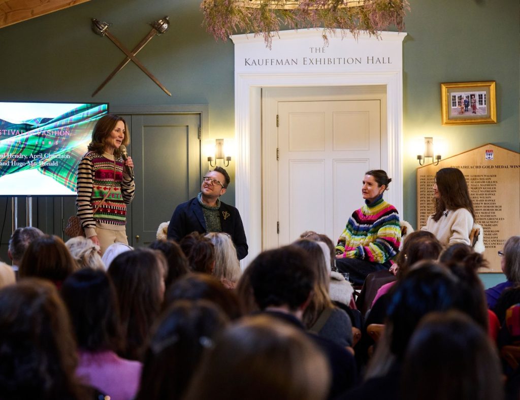 Guests on-stage at Festival of fashion discussing sustainability in fashion