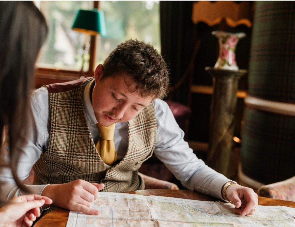 Hotel porter directing a guest for a suitable walk