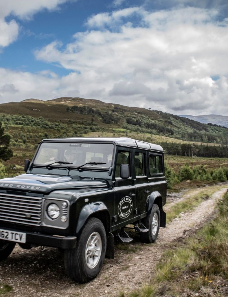Fife Arms Land Rover driving through the landscape
