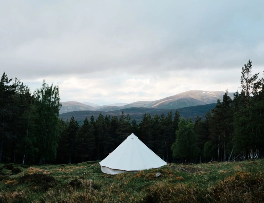 Bell tent situated in the hills of the Cairngorms National Park.