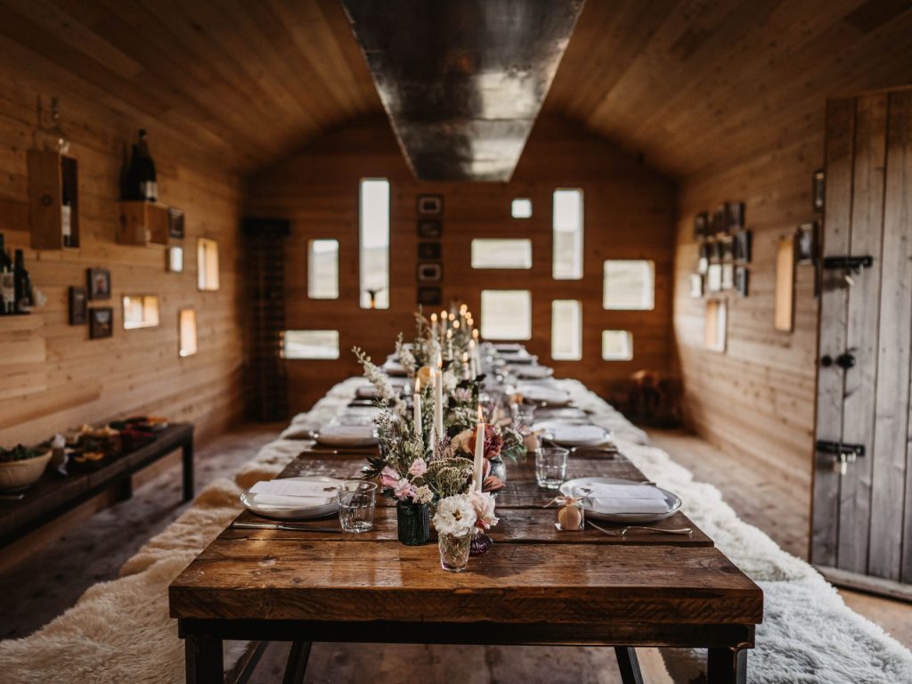 A table set for a special occasion in a minimalist cabin