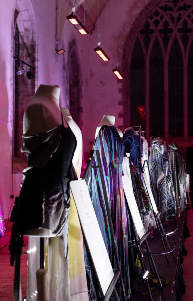 Dresses on mannequins in a church