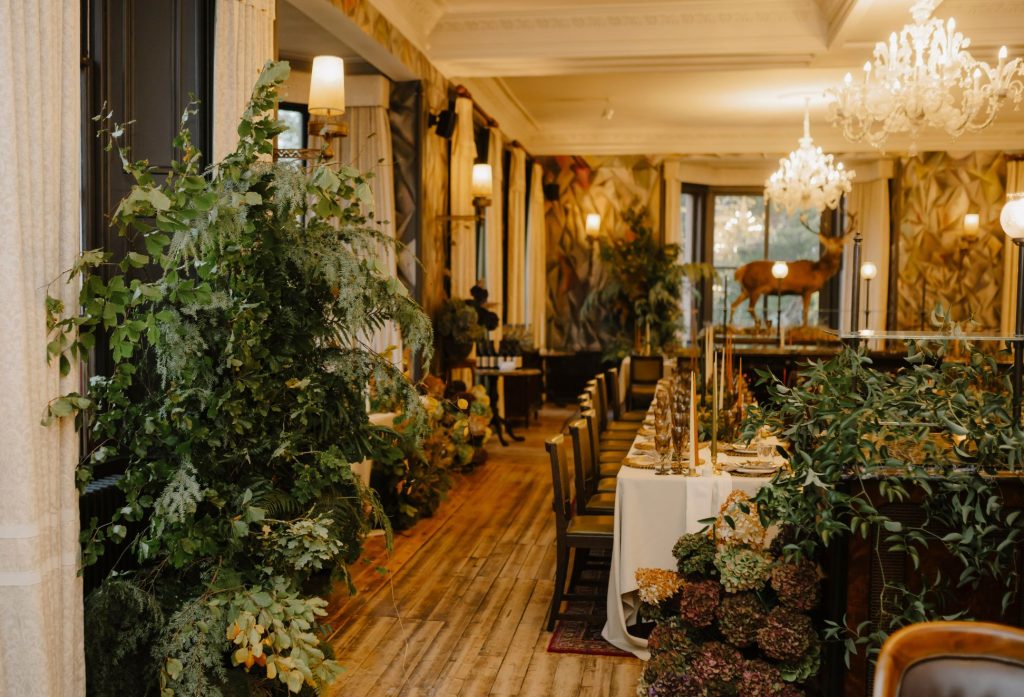 A grand dining room set for a wedding reception